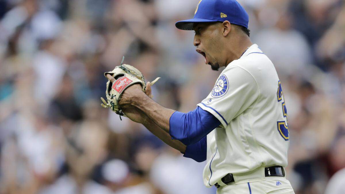 Seattle Mariners closing pitcher Edwin Diaz reacts after the final out of a baseball game against the New York Yankees, Sunday, Sept. 9, 2018, in Seattle. (AP Photo/John Froschauer)
