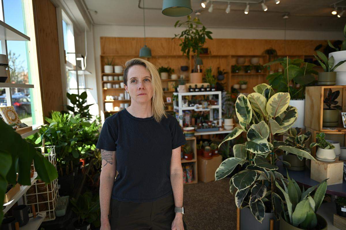 Owner Katherine Raz at The Fernseed on South Tacoma Way, Thursday, Sept. 21, 2023. A reckless driver crashed into the shop in early September causing the shop to close for four days to repair the damage.
