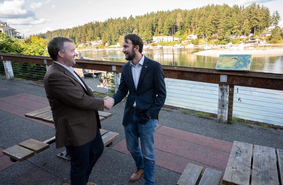 Republican Spencer Hutchins (left) and Democrat Adison Richards are opponents in the 26th District state representative race. They are shown at Old Ferry Dock in Gig Harbor, Washington, on Thursday, Sept. 29, 2022.