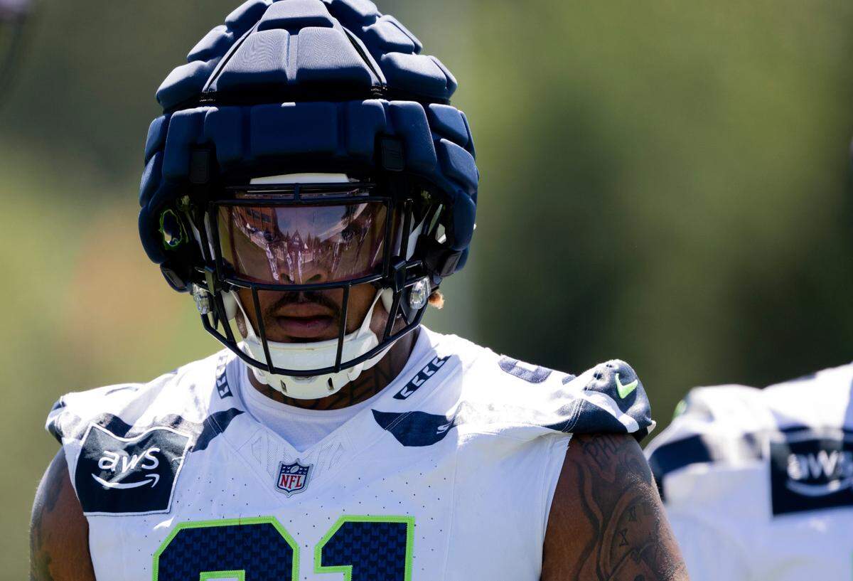 Seattle Seahawks defensive tackle Byron Murphy II (91) runs drills during the first day of training camp at the Virginia Mason Athletic Center, on Wednesday, July 24, 2024, in Renton.