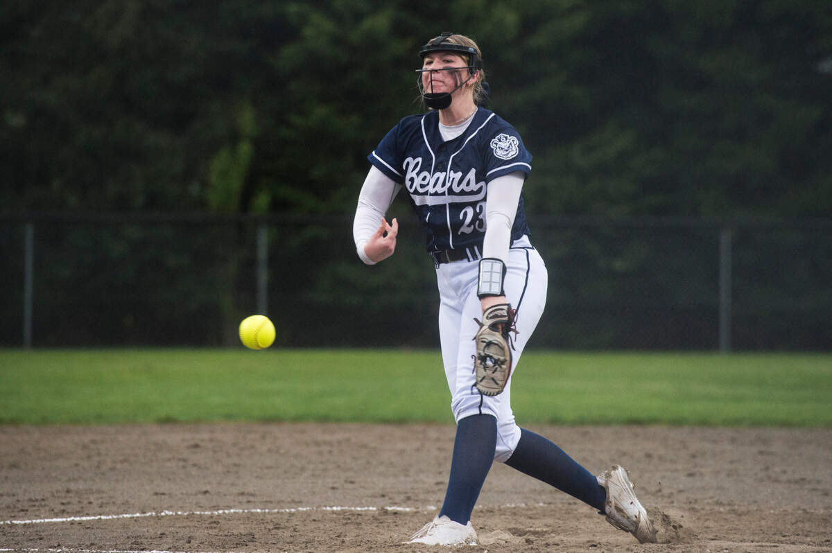Olympia starter Sami Potvin (23) pitches in a 4A SPSL softball game against Rogers on Thursday, May 4, 2023 at Heritage Recreation Center in Puyallup, Wash.