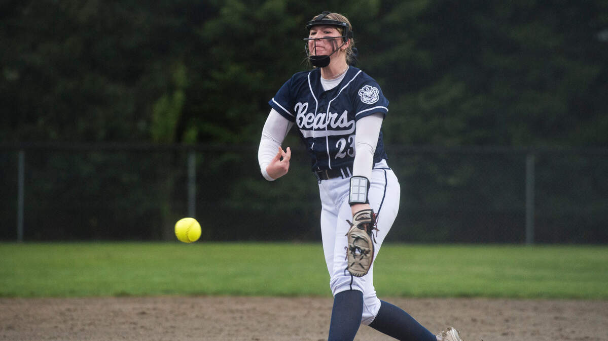 Olympia starter Sami Potvin (23) pitches in a 4A SPSL softball game against Rogers on Thursday, May 4, 2023 at Heritage Recreation Center in Puyallup, Wash.