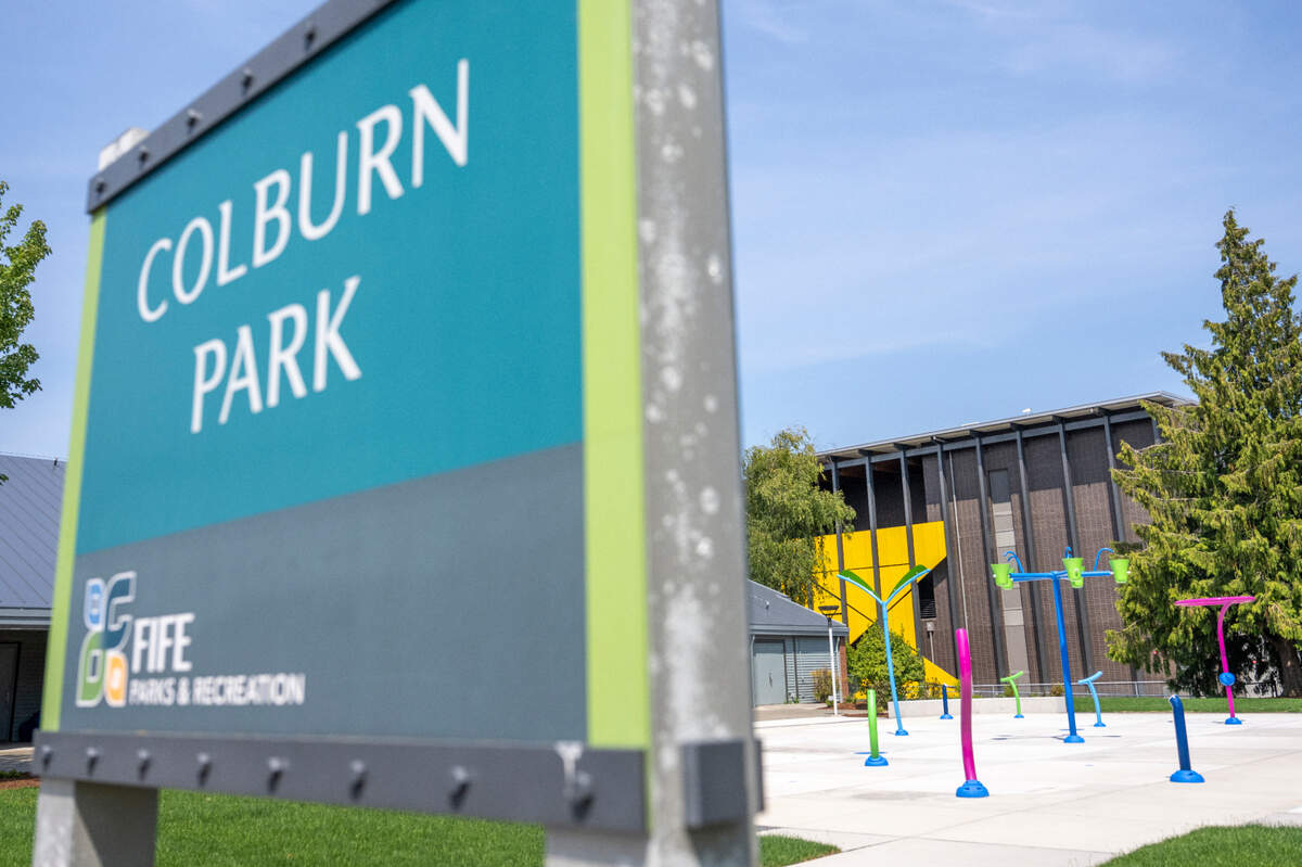 Interactive features for the new splash pad at Colburn Park are visible, right, on Monday, June 23, 2025, as the city prepares for the water play area’s opening July 3 in Fife, Wash.
