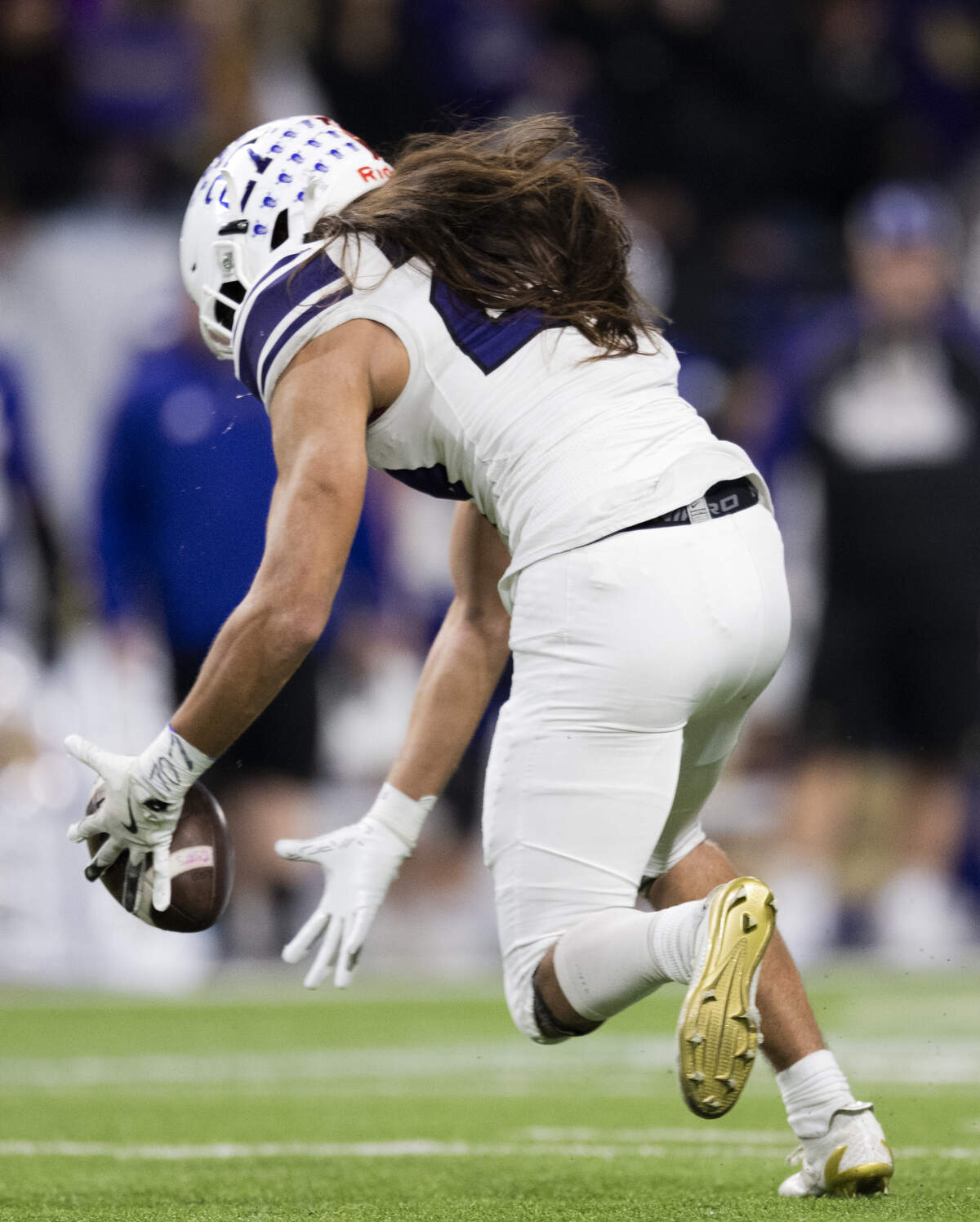 Sumner defensive back Elias Isaacs (27) intercepts the ball against Lake Stevens during the second quarter of the 4A State Championship game at Husky Stadium, on Saturday, Dec. 6, 2025, in Seattle.