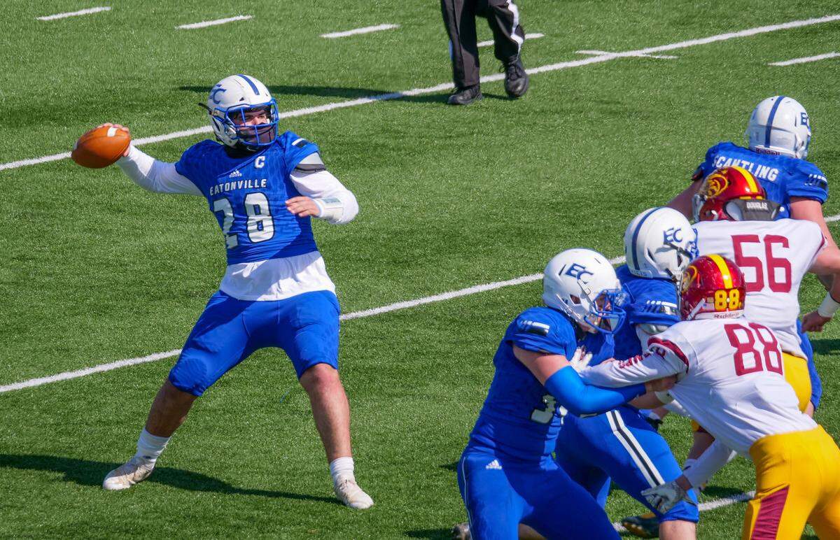 Eatonville High School quarterback Caden Jumper drops back to pass. Eatonville played Enumclaw in a football game on Saturday, March 27, 2021 at Art Crate Field in Spanaway, Wash.