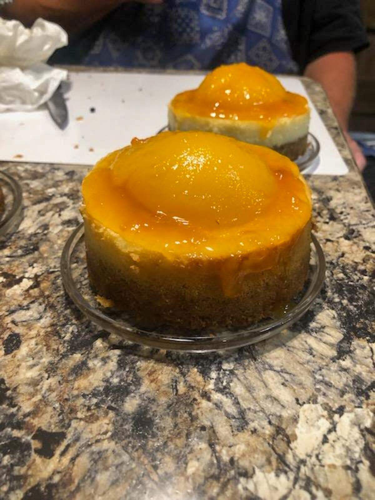 The Original Northwest BBQ Company’s Jack Daniel’s Peach Cheesecake consists of a butter pecan crust, cream cheese mascarpone and sour cream filling topped with peaches marinated in Jack Daniel’s syrup.