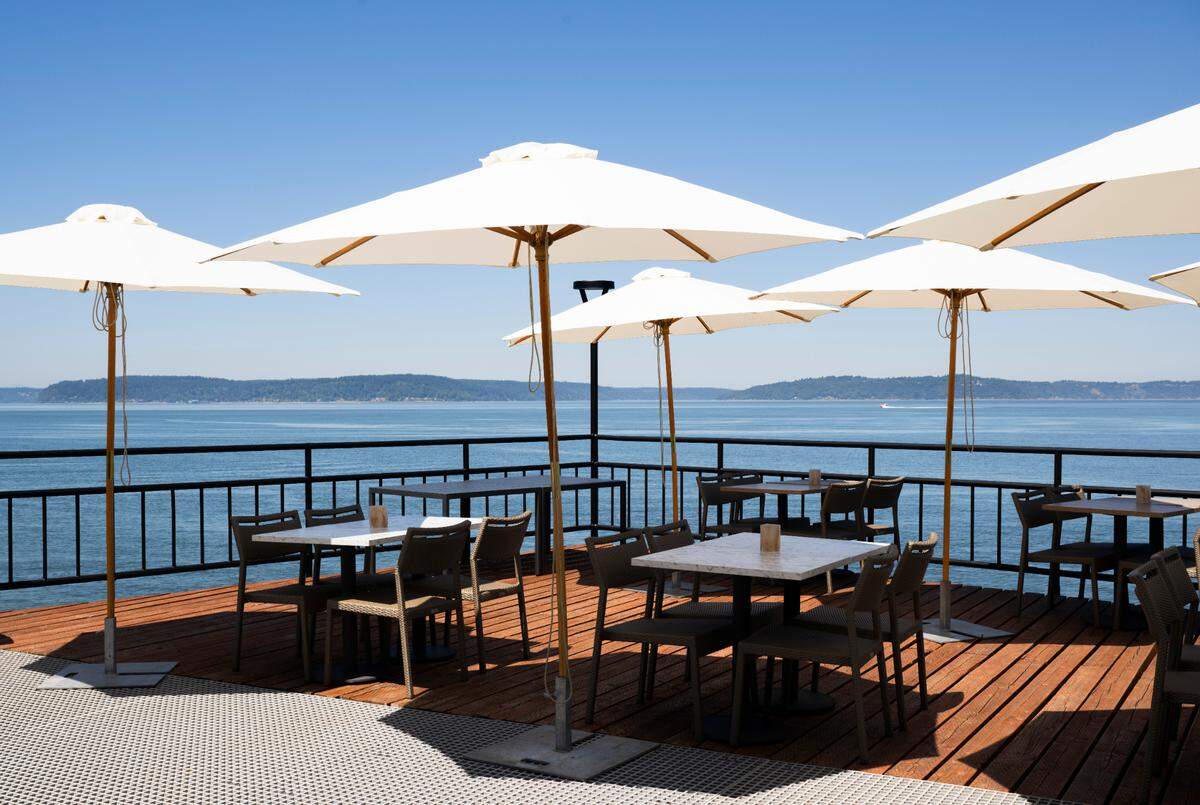The deck has been restored and outfitted with breezy furniture and umbrellas, offering an escape on Puget Sound with a heavy whisper from Hawaii.