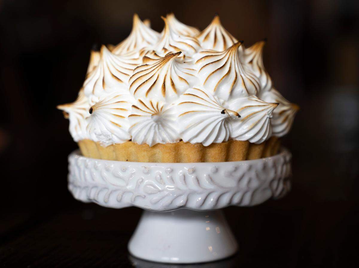 Chef Kylee Nelson taps into nostalgia for the bakery program at Farm 12 in Puyallup, Wash. This lemon meringue tart gets a boost from white chocolate on Friday, February 25, 2022.