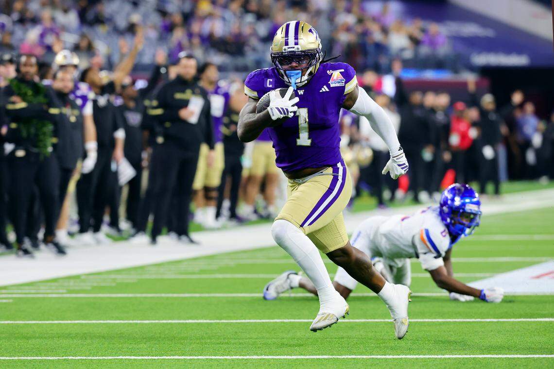 INGLEWOOD, CALIFORNIA - DECEMBER 13: Running back Jonah Coleman #1 of the Washington Huskies runs the ball against the Boise State Broncos during the second half of the LA Bowl Game at SoFi Stadium on December 13, 2025 in Inglewood, California. (Photo by Kevin Terrell/Getty Images)