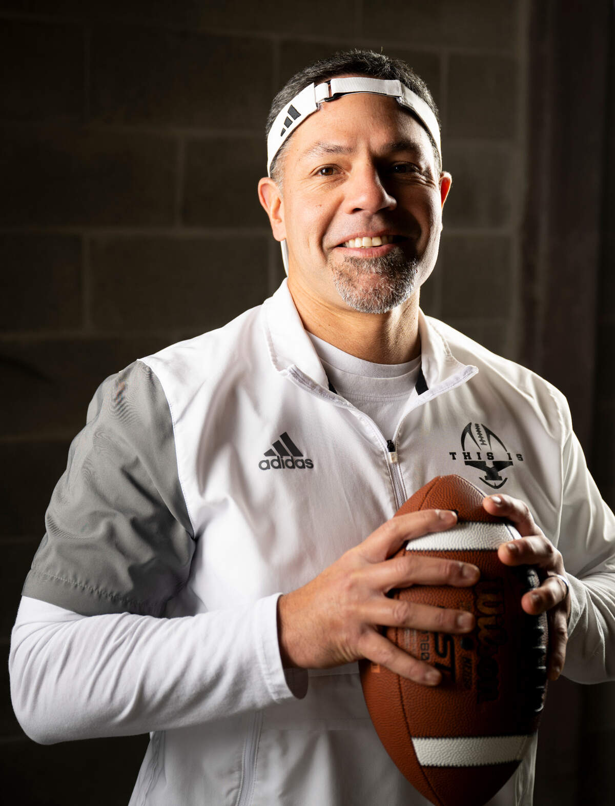 Yelm head coach Jason Ronquillo poses for a portrait after being selected as first-team defensive coordinator for The News Tribune’s 2023 All-Area football team at Mount Tahoma High School, on Sunday, Dec. 10, 2023, in Tacoma, Wash.