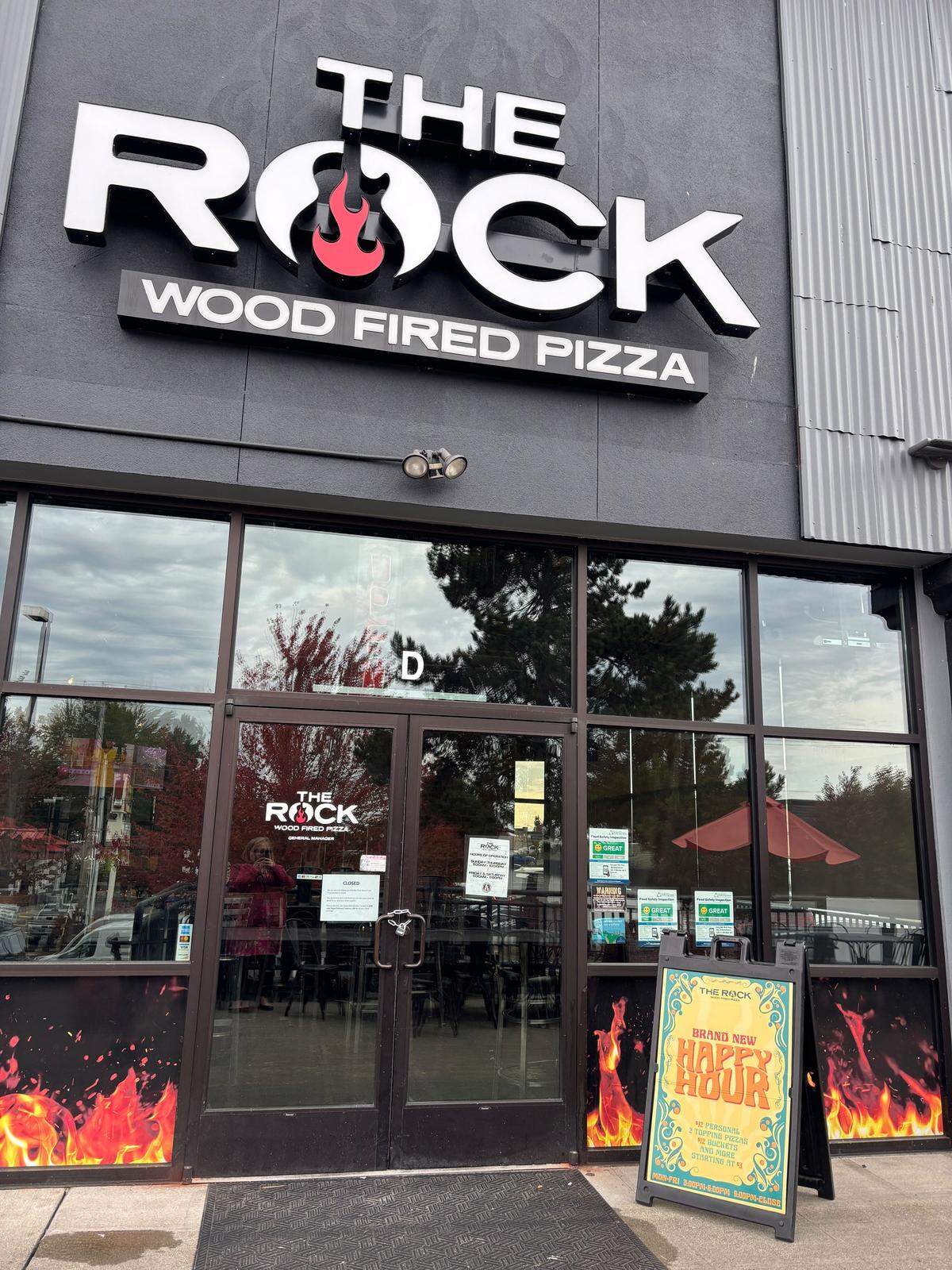 The Rock Wood Fired pizza’s Puyallup location at 4301 South Meridian on Oct. 22, 2025. The restaurant posted a sign on its doors announcing that the location is closed.