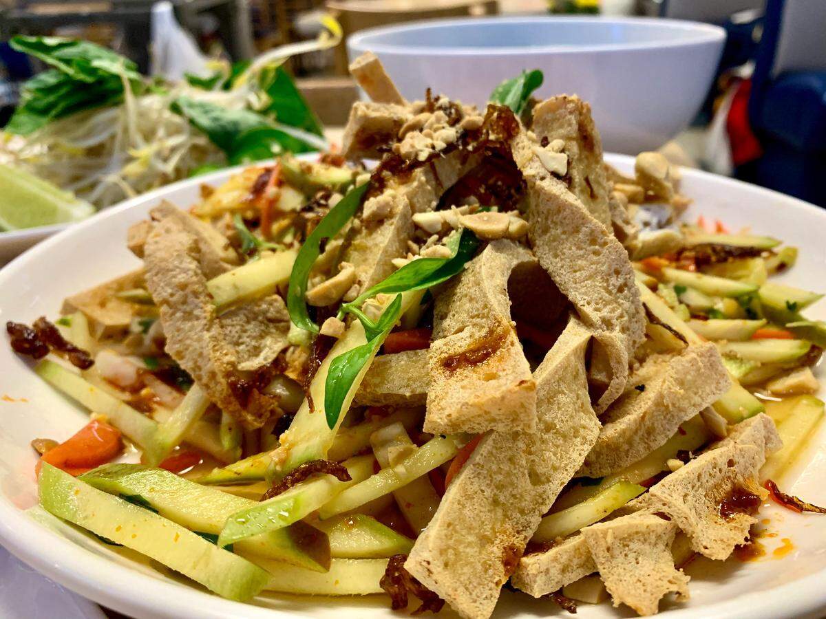 The funky gỏi xoài (green mango salad) at VK Viet Kitchen in Tacoma complements the rest of the menu’s savory flavors.
