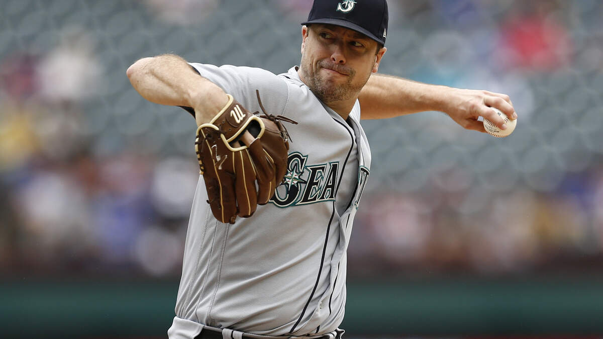 Seattle Mariners starting pitcher Wade LeBlanc delivers a pitch to a Texas Rangers batter during the first inning of a baseball game, Sunday, Sept. 23, 2018, in Arlington, Texas. (AP Photo/Jim Cowsert)