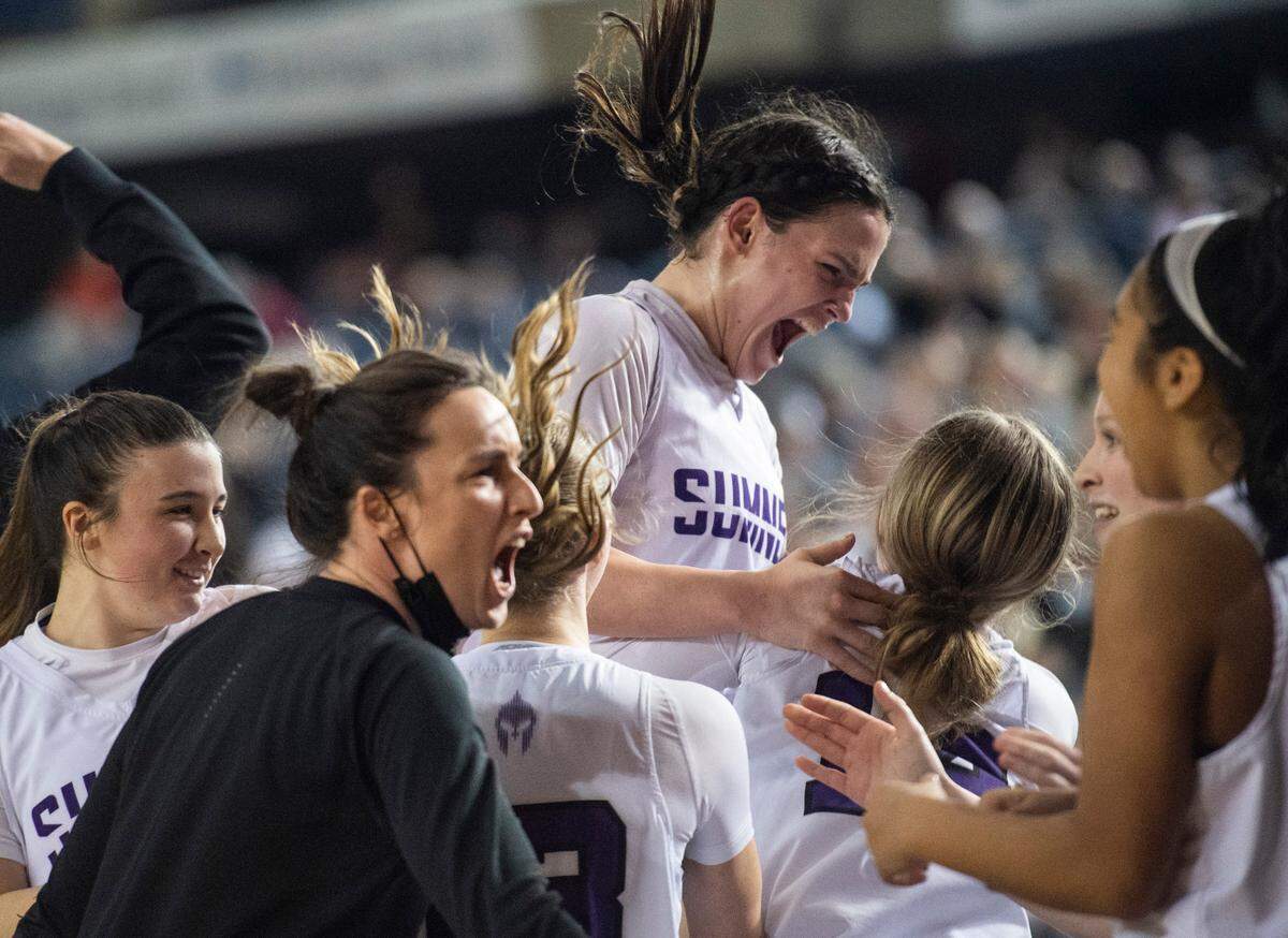 Sumner’s forward Alyson Deaver (33) celebrates after winning the Class 4A quarterfinal state tournament game on Thursday, March 3, 2022, at the Tacoma Dome, in Tacoma, Wash.