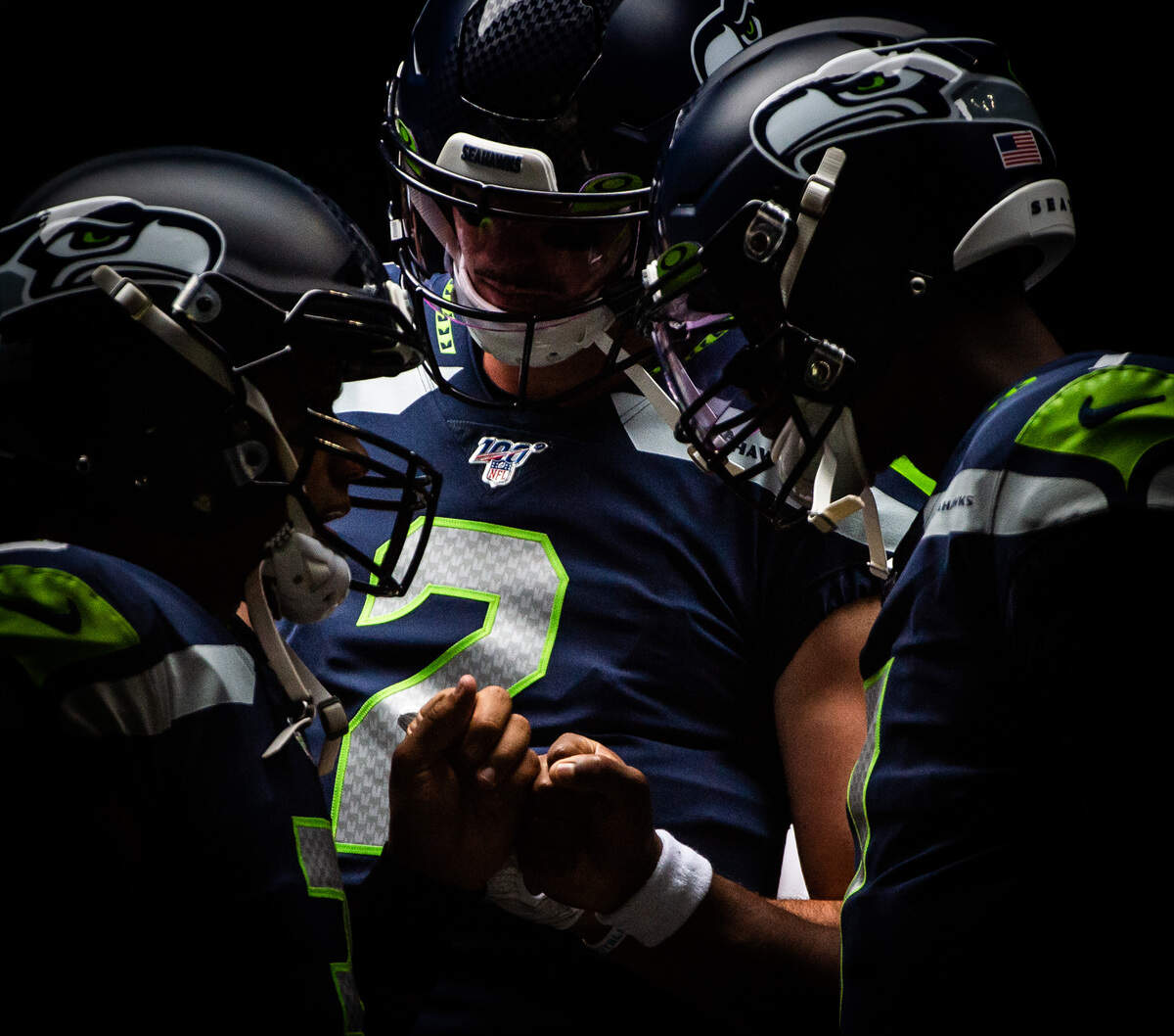 Seattle Seahawks quarterback Russell Wilson (3), Seattle Seahawks quarterback Paxton Lynch (2), and Seattle Seahawks quarterback Geno Smith (7) meet in the tunnel before the game. The Seattle Seahawks played the Denver Broncos in a NFL preseason game at CenturyLink Field in Seattle, Wash., on Thursday, Aug. 8, 2019.