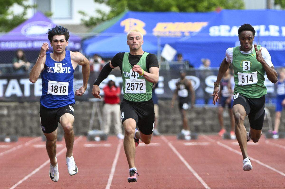 Tumwater’s Jaxon Budd, center, races in the 2A Boys 100M Dash final on Saturday, May 30, 2026, at the 2026 State Track & Field Championships in Tacoma, Wash. Budd finished in fourth place.