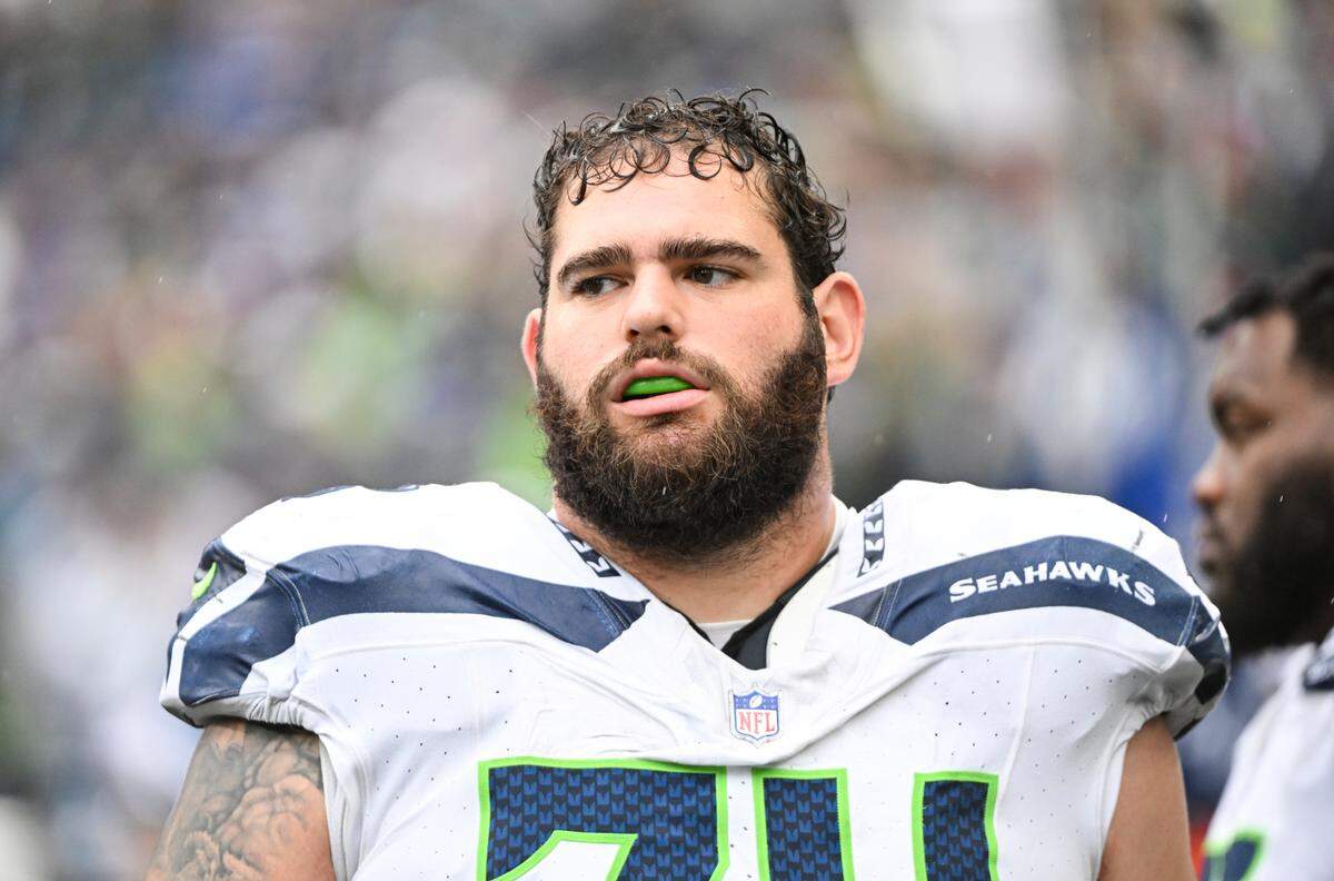 Seattle Seahawks offensive tackle Jake Curhan (74) watches from the sidelines during the third quarter of the game against the Carolina Panthers at Lumen Field, Sunday, Sept. 24, 2023, Seattle, Wash.