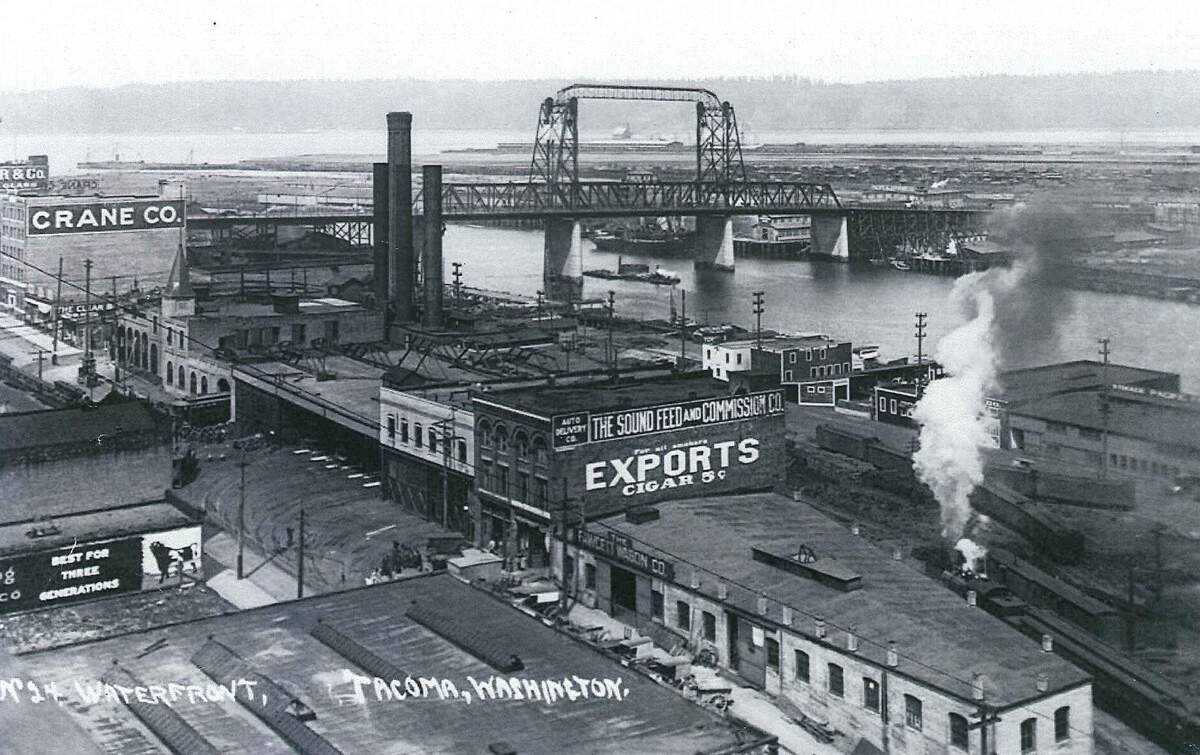 The Consumer Central Heating Plant provided steam heat to downtown businesses. The plant, with its 200-foot-high smokestack, was demolished in the 1980s. The site is now Melanie’s Park.