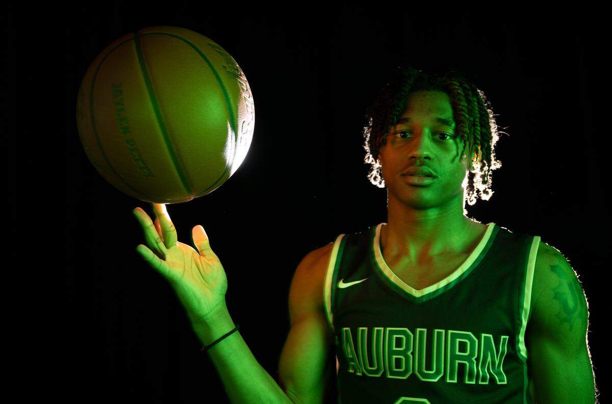 Auburn’s Jaylen Petty poses for a portrait after being selected as The News Tribune’s 2024 All-Area basketball player of the year, at Silas High School, on Sunday, March 17, 2024 in Tacoma, Wash.