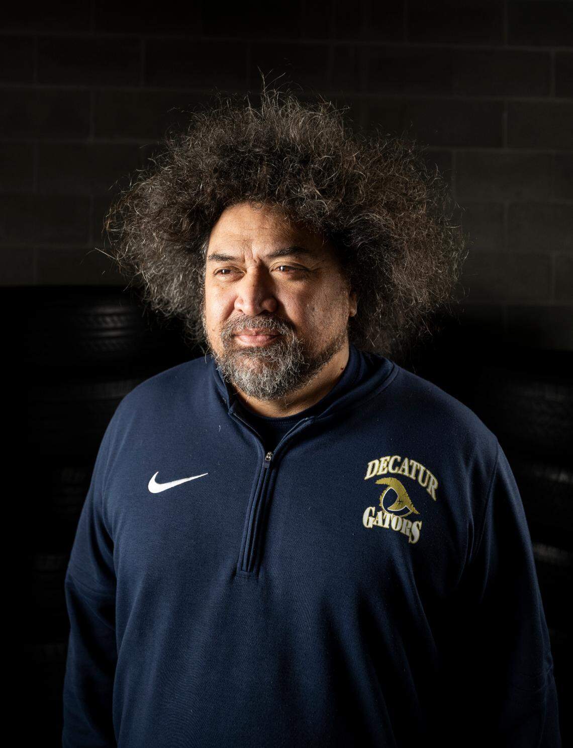 The News Tribune 2024 All-Area first-team coach of the year selection Decatur head coach Matt Vaeena poses for a portrait at Mount Tahoma High School, on Sunday, Dec. 8, 2024, in Tacoma.