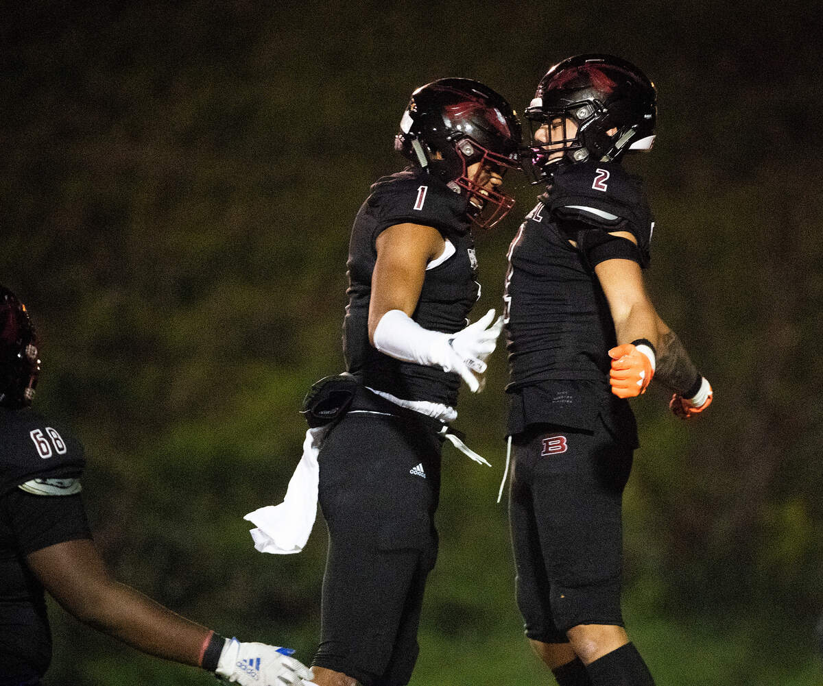 Bethel’s Peter Latu and Puka Sokimi celebrate a touchdown during the first quarter. Lincoln played Bethel in a a football game at the Lincoln Bowl in Tacoma, Wash., on Friday, Nov. 1, 2019.