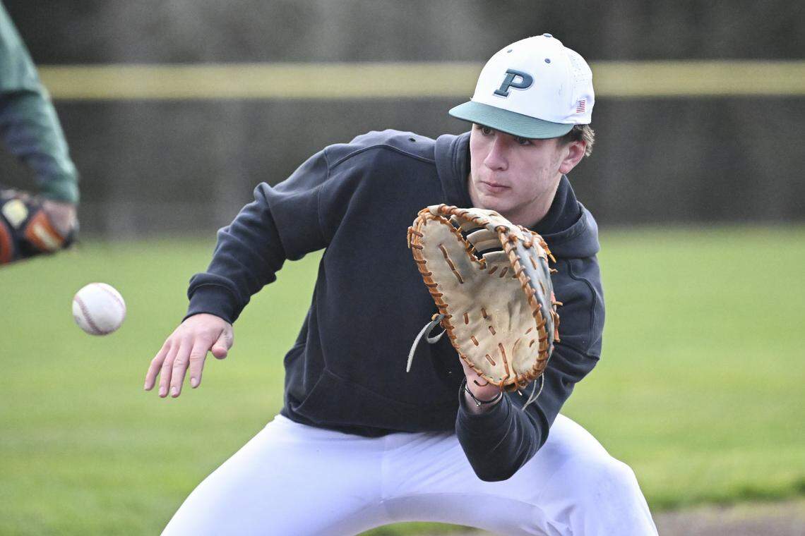 Peninsula first baseman Thomas Marzano catches the ball during a practice on Monday, March 9, 2026, in Gig Harbor, Wash.