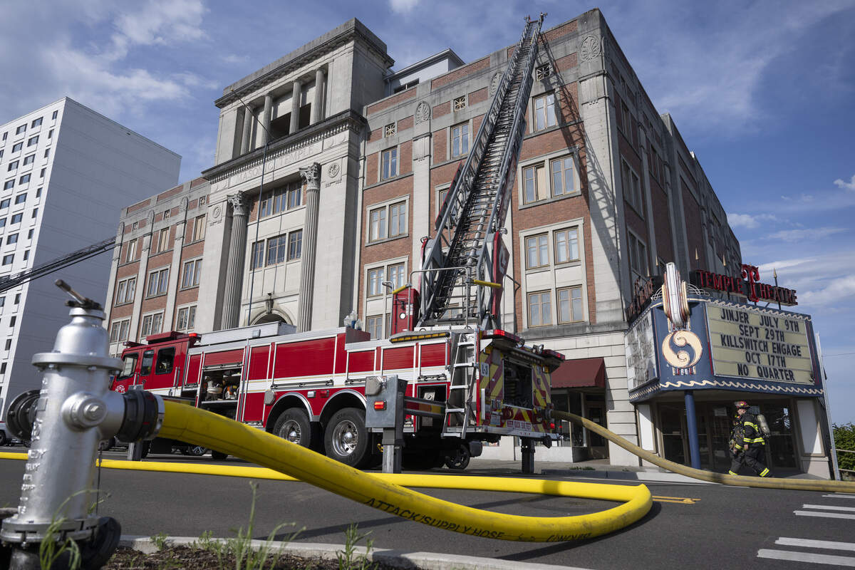 A fire broke out on the roof of Tacoma’s Temple Theater on Tuesday, May 12, 2026, in Tacoma, Wash.