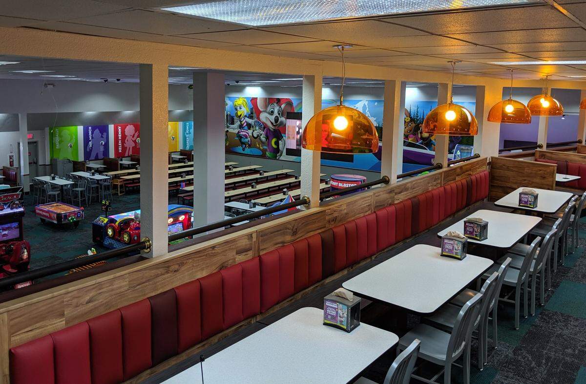 In addition to new games, the Tacoma Chuck E. Cheese updated its dining room with banquette seating and charging stations.