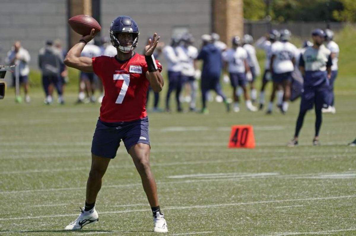 Veteran quarterback Geno Smith throws during Seahawks’ offseason practice May 31, 2022, at the Virginia Mason Athletic Center in Renton.