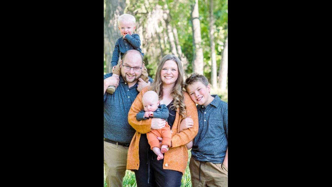 Joshua Hendricks (left) raced to a hospital after a car struck the stroller his wife, Amanda (center), was pushing, which was carrying their two youngest children on May 23 in Spokane Valley.