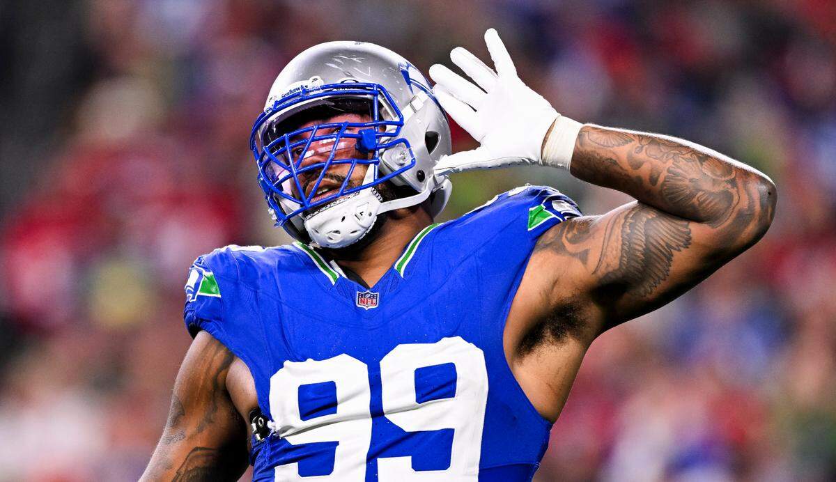 Seattle Seahawks defensive end Leonard Williams (99) gets the crowd hype during the forth quarter of the game against the San Francisco 49ers at Lumen Field, on Thursday, Oct. 10, 2024, in Seattle.