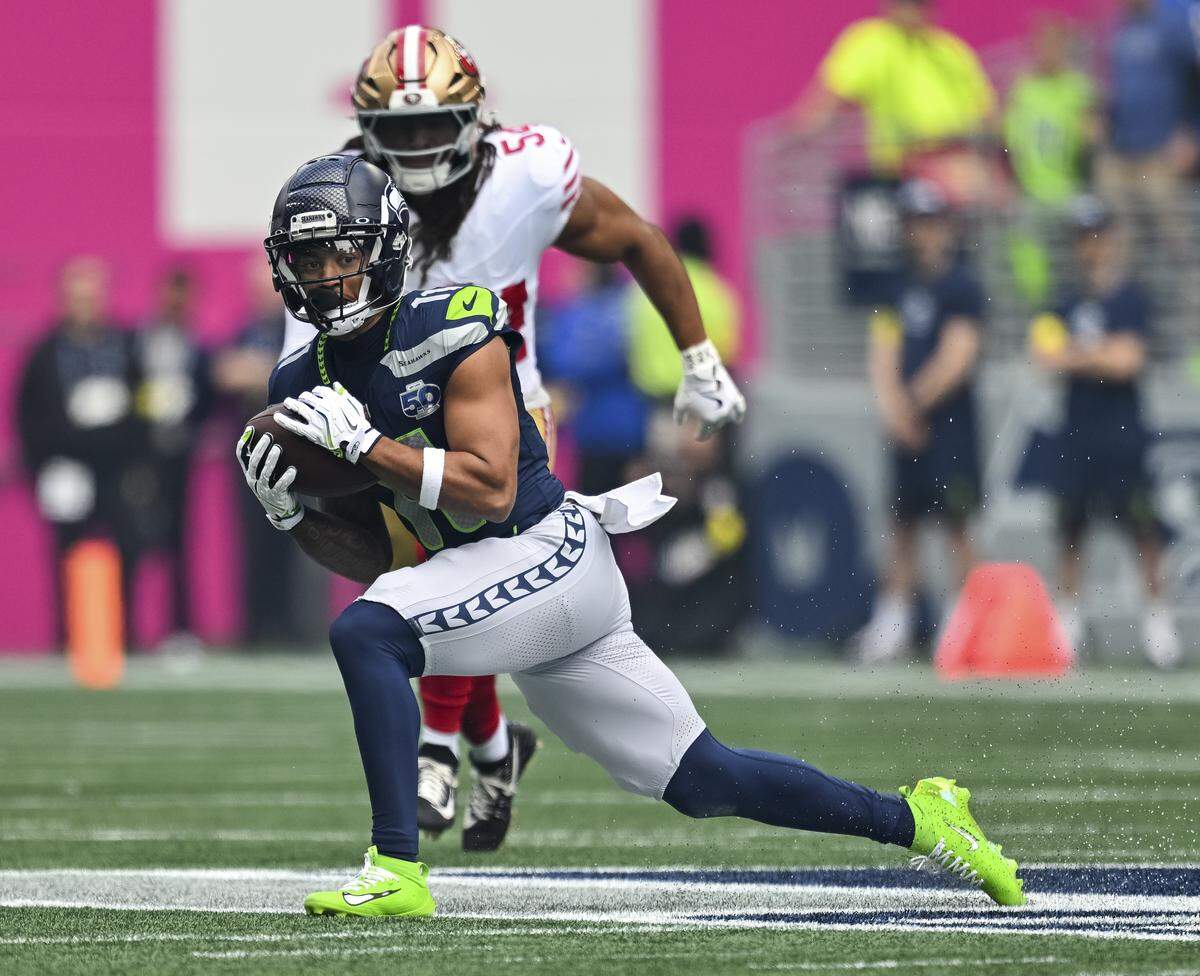 Seattle Seahawks wide receiver Jaxon Smith-Njigba (11) hauls in an 18-yard reception during the first quarter of the game against the San Francisco 49ers at Lumen Field, on Sunday, Sept. 7, 2025, in Seattle.