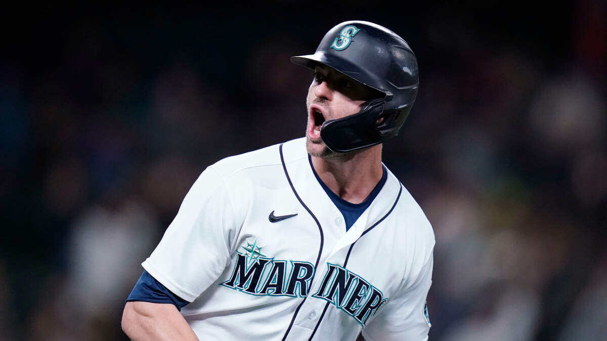 Seattle Mariners’ Mitch Haniger yells as he begins to round the bases on his three-run home run against the Oakland Athletics in the fourth inning of a baseball game Monday, Sept. 27, 2021, in Seattle. (AP Photo/Elaine Thompson)
