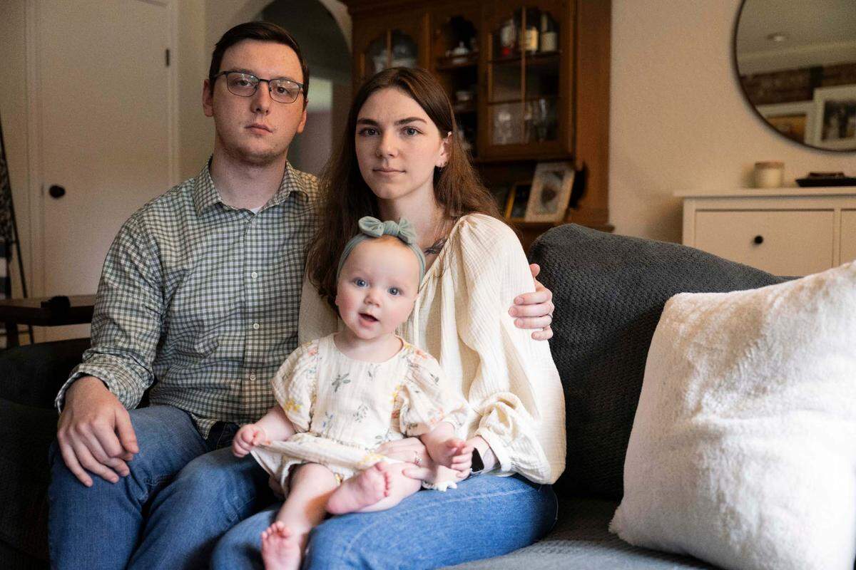 Abraham and Annie Thigpen, who were accused in October of abusing their 5-week-old infant, Winona, pose for a portrait at home, on Wednesday, April 24, 2024, in Gig Harbor.