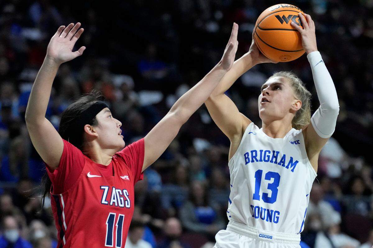 BYU’s Paisley Harding (13) shoots over Gonzaga’s Kayleigh Truong (11) during the second half of an NCAA women’s championship college basketball game at the West Coast Conference tournament Tuesday, March 8, 2022, in Las Vegas. (AP Photo/John Locher)