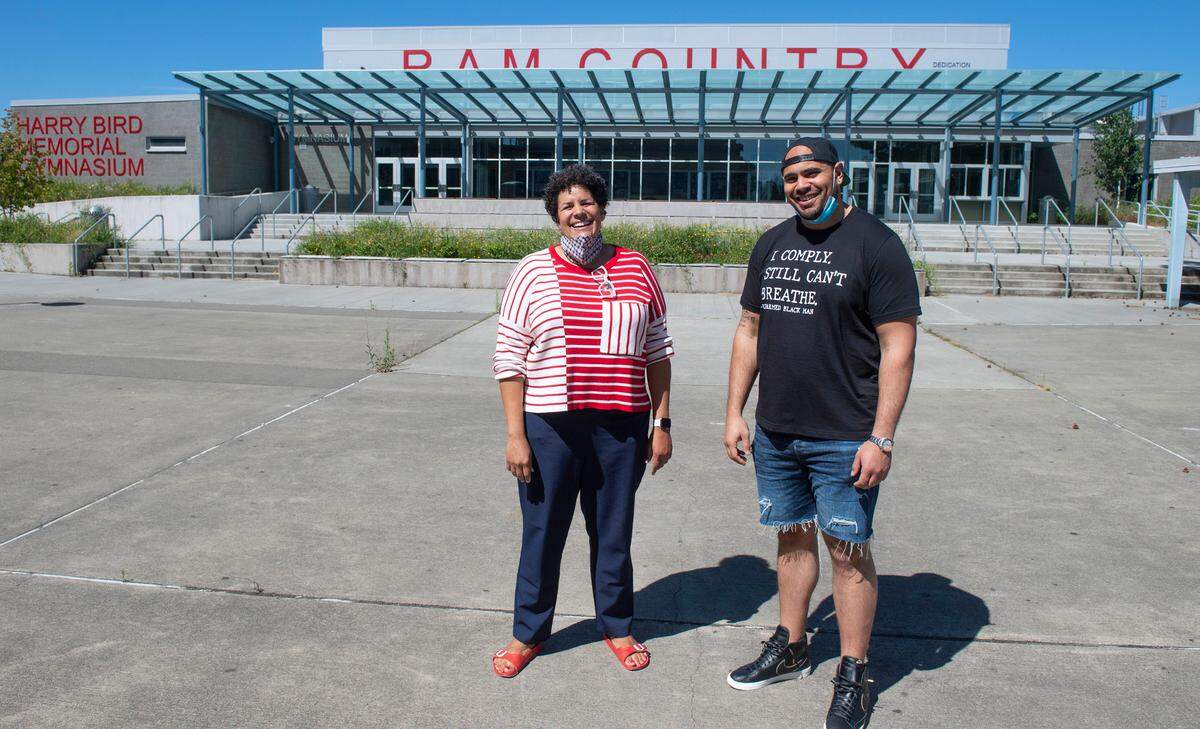 Wilson High principal Bernadette Ray and 2010 alum Xavier Cooper are hoping to rename the northwest Tacoma high school because of President Woodrow Wilson’s support for the Ku Klux Klan. They are shown at the school on Tuesday, July 14, 2020.