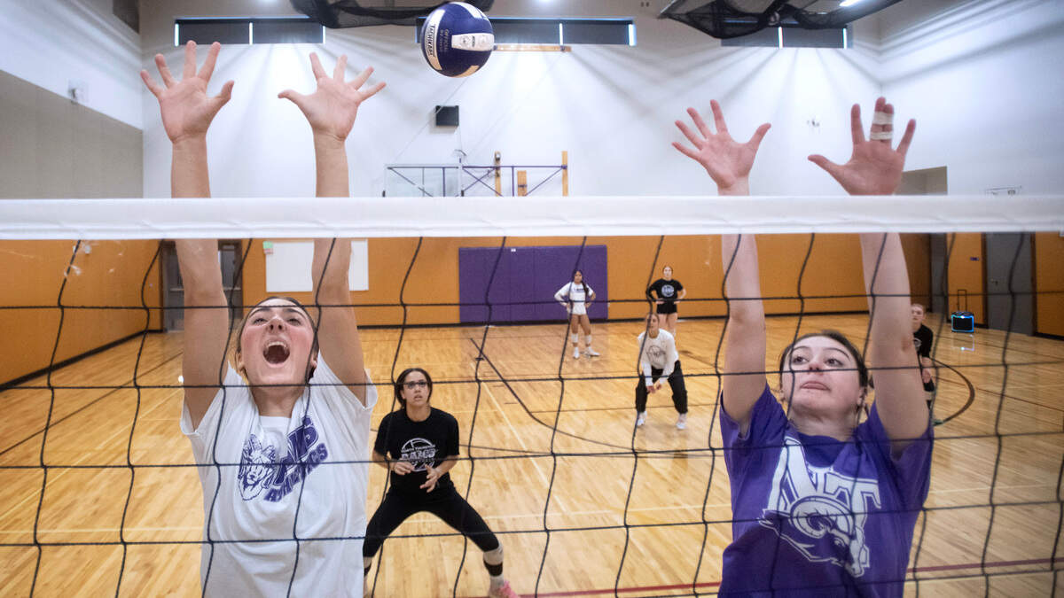 North Thurston seniors Alexis Meyer (left) and Madison LaVack run through blocking drills during volleyball practice at North Thurston High School in Lacey, Washington, on Tuesday, Nov. 14, 2023.