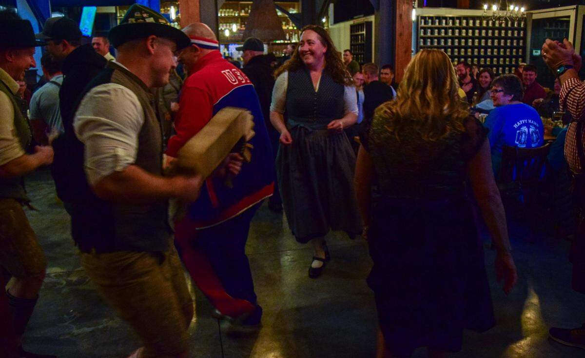 Guests enjoy the music from Happy Hans German Band at Berliner Beerhall’s grand opening.