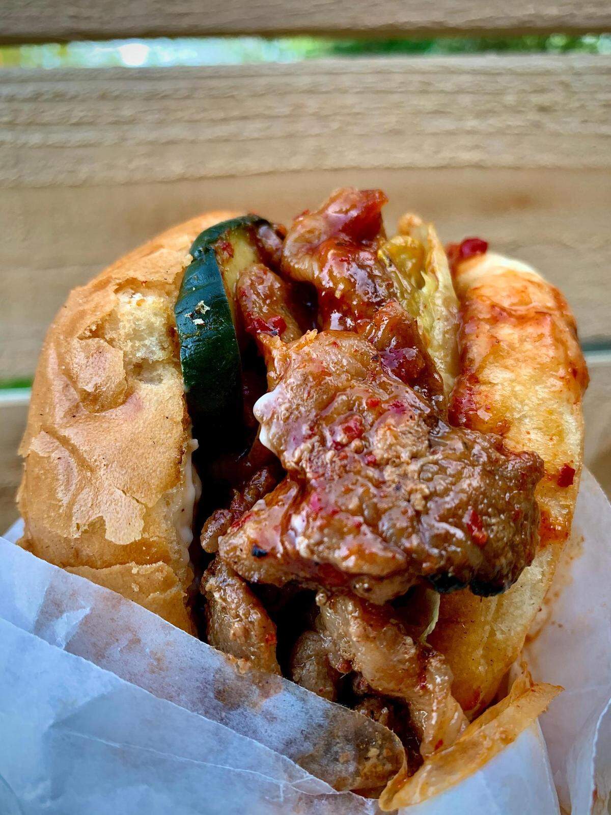 The Fire Soul, like all the burgers and sandwiches at Burger Seoul, a food truck in central Tacoma, belies its Korean roots with pickled cucumber and the house Seoul sauce.