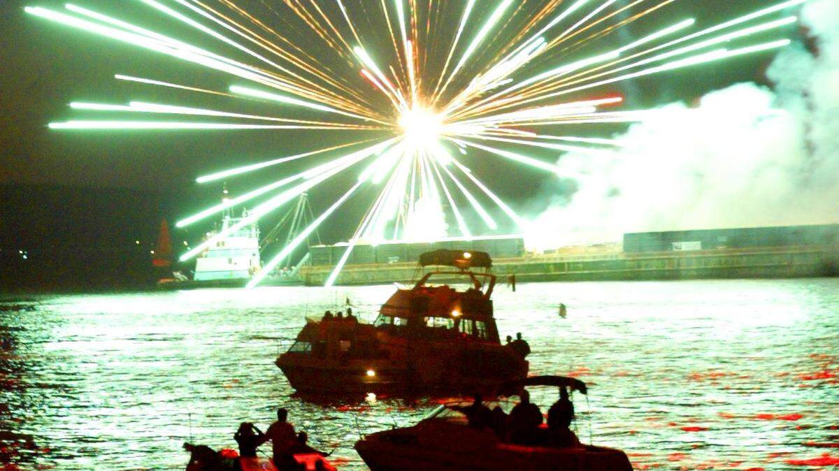 SLUG: FREEDOM FAIR RUN DATE: A1CP, 7/5/04 PHOTO TAKEN: Tacoma, 7/4/04 Fireworks explode over Commencement Bay, capping off a full day of Fourth of July activities at the Freedom Fair in 2004. An end-of-summer fireworks show is scheduled for this Saturday along the Ruston Way waterfront.