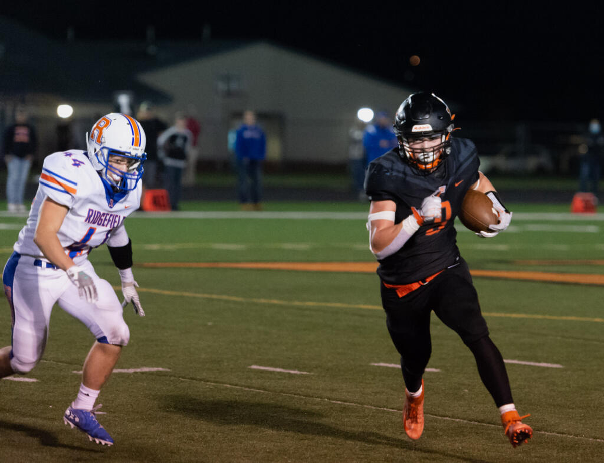Washougal High School quarterback Holden Bea during a game against Ridgefield in 2021.