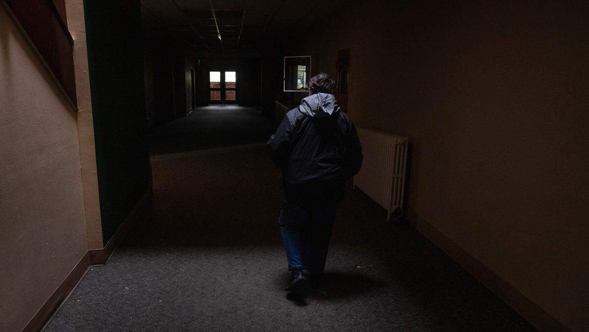 Wendy Freeman, co-secretary of the Parkland Community Association, walks through the former Parkland School building in Parkland, Washington, on Tuesday, June 4, 2024. The association purchased the building with plan of turning it into a community center and multi-agency hub.