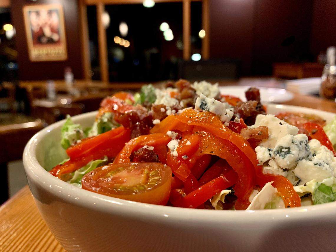 Fondi salads, like this one with gorgonzola, pancetta and roasted red peppers, are generous, with housemade dressings, and available in three sizes.