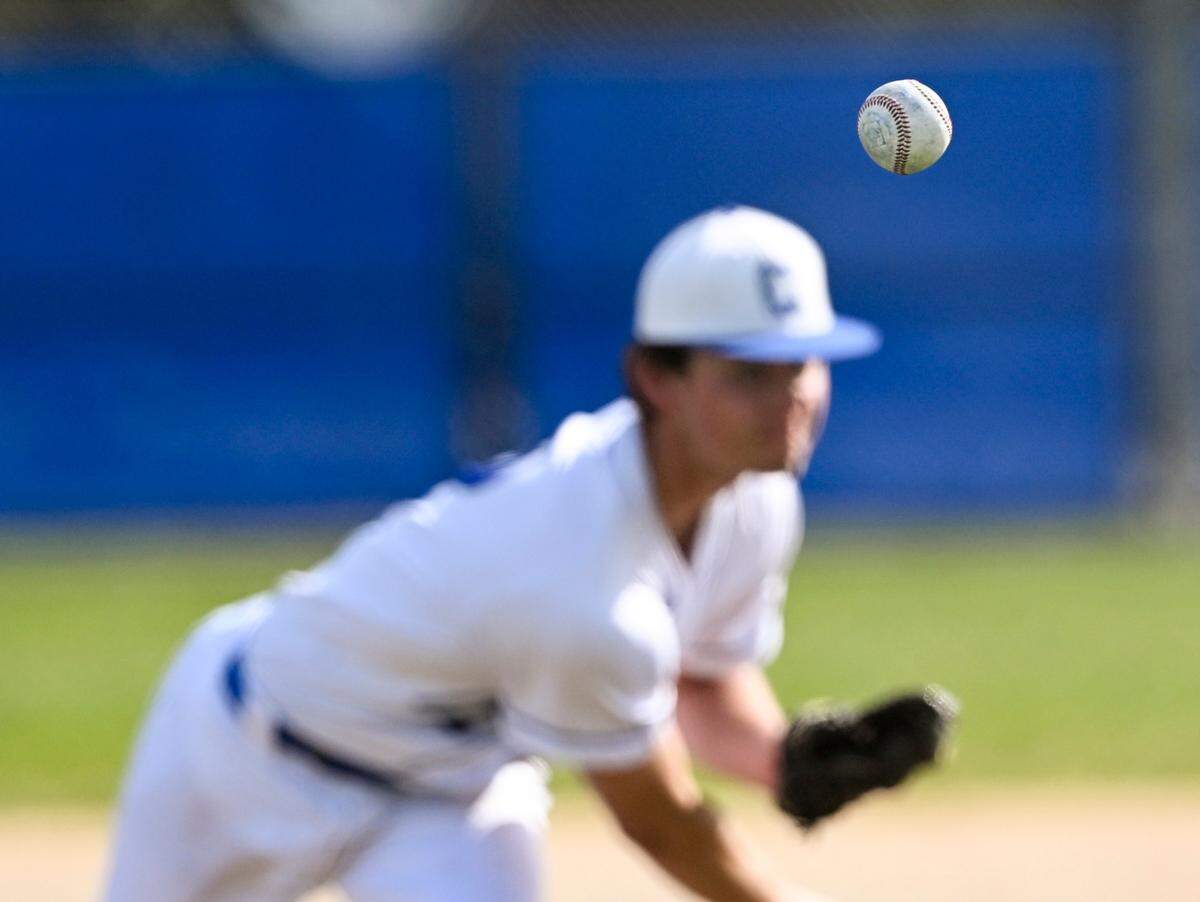 Curtis’s Cooper Hordyk (12) pitches against Puyallup during the baseball game at Curtis Senior High School, on Tuesday, April 15, 2025, in University Place.
