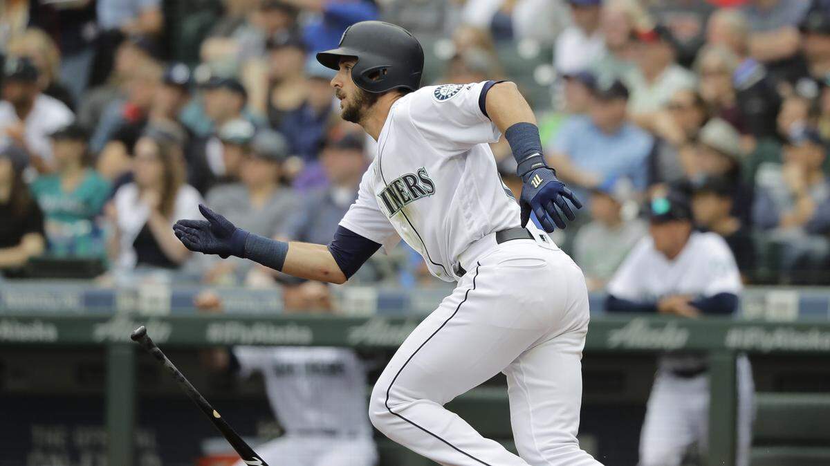 Seattle Mariners’ Austin Nola heads to first base after hitting a two-RBI triple against the Detroit Tigers during the fourth inning of a baseball game, Saturday, July 27, 2019, in Seattle.