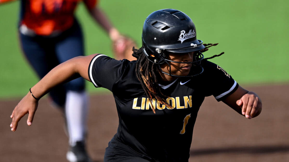 Lincoln’s Joy Wilde sprints to third base during the game against Lakes at Lincoln High School, on Tuesday, April 30, 2024, in Tacoma.