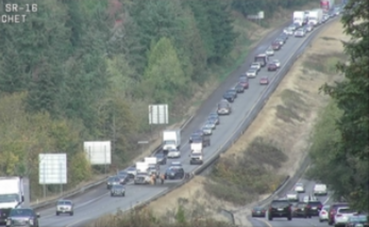 A trailer rolled over Wednesday morning on eastbound state Route 16 in Gig Harbor, forcing traffic to the shoulder and causing miles of backups, according to the Washington State Department of Transportation. No injuries were reported.