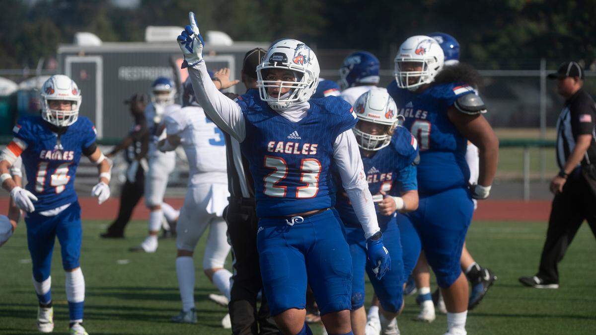 Graham-Kapowsin linebacker Leuma Teylor-Pomele celebrates a two-point conversion stop of the Curtis Vikings during Saturday’s football game at Art Crate Field in Spanaway, Washington, Oct. 8, 2022. Graham-Kapowsin won the game, 24-19.