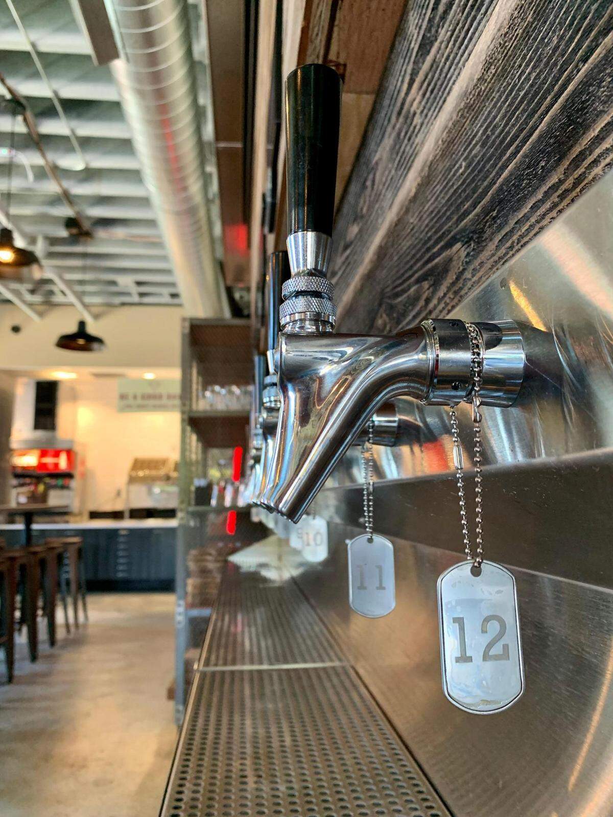 Each tap handle has a corresponding number and tablet explaining what you’ll pour.