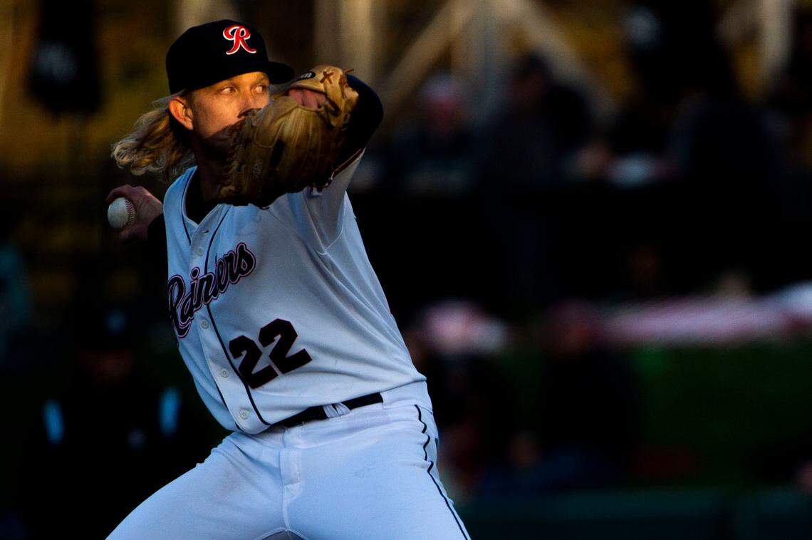 Tacoma Rainiers starter Darren McCaughan (22) delivers a pitch to a Salt Lake Bees batter during the second inning of the season opener at Cheney Stadium in Tacoma, Wash., Tuesday, April 5, 2022.